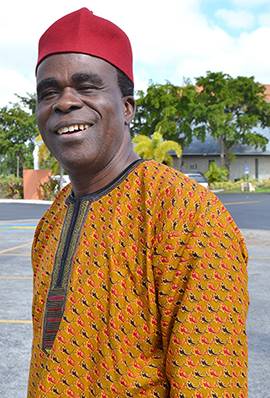 Emmanuel Okwor of St. Helen Church assisted at the third annual ThanksForGiving Mass, celebrated on Nov. 16, at St. Clement Church, in Broward.