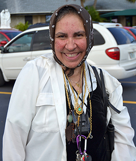 Esther Castillo Price from of Our Lady Queen of Heaven Church was among the more than 400 attendees at the third annual ThanksForGiving Mass, celebrated on Nov. 16, at St. Clement Church, in Broward.