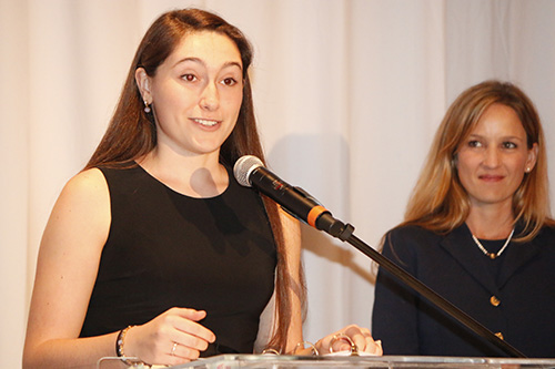Eve Moll, 17, recipient of a Woman of Faith medallion for the virtue of youth, extols the value of a Catholic education in her speech to luncheon guests. She attended St. David School in Davie, St. Gregory in Plantation and is now a senior at St. Thomas Aquinas High School in Fort Lauderdale.