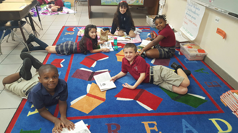 Read-a-thon: St. Andrew School kindergarteners, along with first and second graders, joined for a Read-a-thon fundraiser to raise funds for a water pump for St. John Vianney School in Flint, Michigan.