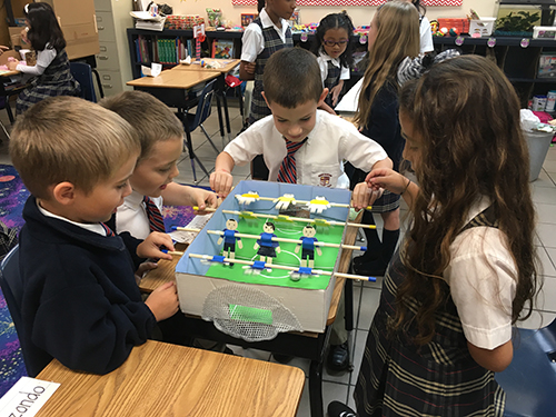 It's game time: St. Andrew School second graders raise funds for a water pump for St. John Vianney School in Flint, Michigan by hosting a Game Day.