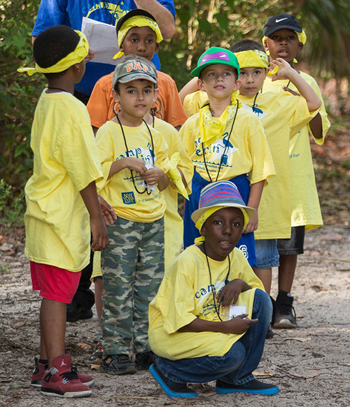 Campers prepare for a nature walk at Camp Erin.