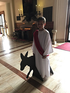 Jesus, played by Marco Alberni, enters the church.