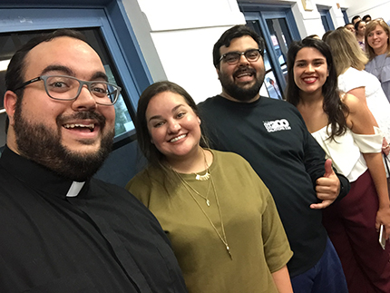 Encuentros Juveniles past and current coordinators pose for a photo. Among the leaders, from left to right, are Deacon Matthew Gomez, Annette Barroso, Alexander Gomez, and Rebecca Garcia, the current coordinator.