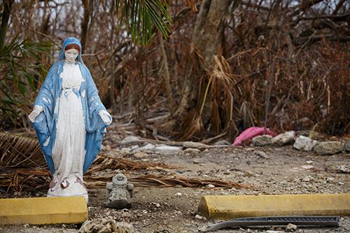 A statue of Our Lady stands among the debris at the Miami archdiocesan church most devastated by Hurricane Irma, St. Peter the Fisherman in Big Pine Key. The church has been deemed unusable and is expected to be rebuilt.
