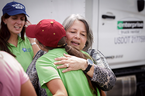 Angelina Castillo Kelley, a housing manager for a Key West Housing Authority residence for senior citizens, thanks volunteers from throughout the Archdiocese of Miami who delivered a caravan of emergency supplies Sept. 26 to locations throughout the Florida Keys as that region recovers from Hurricane Irma.
