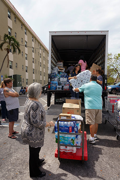 Volunteers from throughout the Archdiocese of Miami deliver a caravan of emergency supplies Sept. 26 to locations throughout the Florida Keys as that region recovers from Hurricane Irma. The donated items had been collected at a dozen Catholic schools and parishes in Miami following the storm, and were left at hard-hit sites and agencies from Key Largo to Key West.