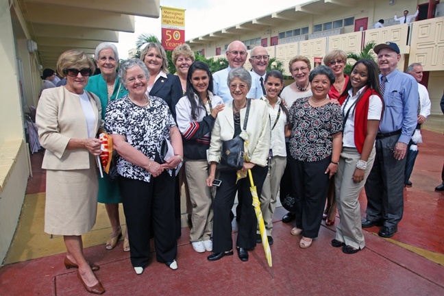 Members of the Teresian Association, who taught at Pace for three decades beginning in 1961, pose for a photo after the 50th anniversary Mass along with some current students, current principal Ana Garcia (third from right) and Marist Brothers who also taught at the school from the very beginning.