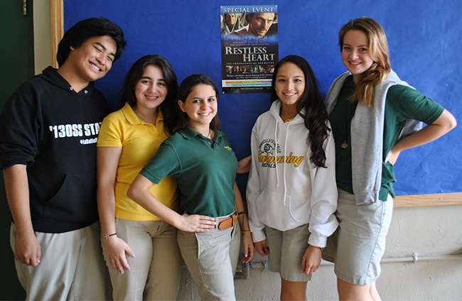 Key Club members get together to promote the screening of Restless Heart Oct. 27. From left: Steven Coward, senior; Natalie Lopez, Key Club vice president and a senior; Xiomara del Corral, club president, junior; Maria Poveda, junior, and Anna Eakins, junior.