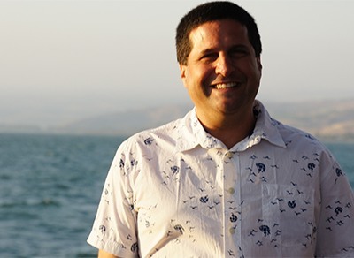 David Masters is pictured here with the Sea of Galilee behind him.