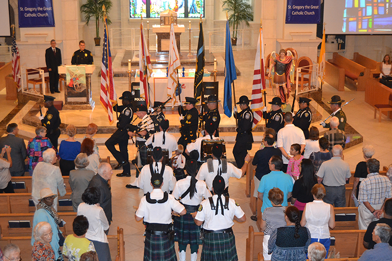 Sept. 28, 2014
Plantation
COURTESY PHOTO

The Black Pearl Pipes and Drums lead the procession into St. Gregory Church at the start of the Mass.

St. Gregory the Great Church hosted its first annual Blue Mass on Sunday, Sept. 28, to honor law enforcement and celebrate the feast of St. Michael, patron saint of police officers.