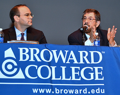 Michael Sheedy, left, of the Florida Catholic Conference listens to Howard Simon of the Florida American Civil Liberties Union.