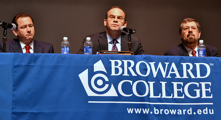 Panelists at the gay marriage debate, from left, are attorney Robert Alwine of Miami; Michael Sheedy, executive director of the Florida Catholic Conference; and Howard Simon, executive director of the Florida American Civil Liberties Union.