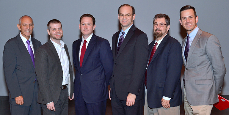 Panelists pose for a group photo after the recent debate on same-sex marriage and religious liberty at Broward College South. From left are lawyer Richard Milstein of Miami; Michael Hurlburt, assistant professor of philosophy at the college; attorney Robert Alwine of Miami; Michael Sheedy, executive director of the Florida Catholic Conference; Howard Simon, executive director of the Florida American Civil Liberties Union; and Henry Mack, associate dean of academic affairs at the college.