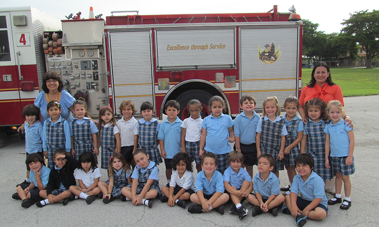On Oct. 22, the early childhood students at Sts. Peter and Paul School in Miami celebrated Fire Prevention Month. After several lessons, the unit terminated with the visit of a fire truck to the school. John Fernandez, parent of one of the students, brought the truck and gave a live presentation on this topic. Every year the students look forward to this important day. Seen here: the pre-k4 students with their teachers pose in front of the truck.