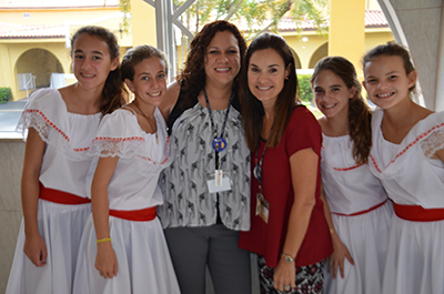Taking part in Hispanic Heritage Day, from left, St. Agnes Academy students Nicole Gaviria and Mora Guyot, Spanish teachers Joansis Pons and Carmen Castellon, and students  Jacqueline Macia, and Bella Ortega.