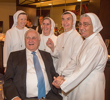 Sisters of St. Joseph Benedict Cottolengo from the Marian Center pose for a photo with Coach Don Shula during St. Joseph Church's annual gala in Miami Beach; from left: Sister Lidia Valli, Sister Filomena Mastrangelo, Sister Faustina Rondena and Sister Carla Valentini.