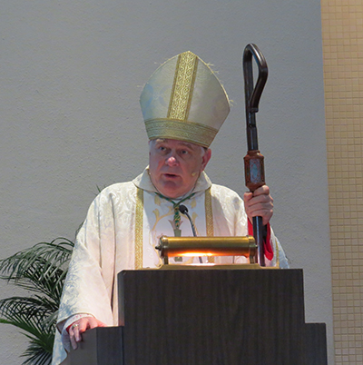 Archbishop Thomas Wenski preaches the homily during the annual memorial Mass hosted by Catholic Hospice for families of people who have died in the past year.