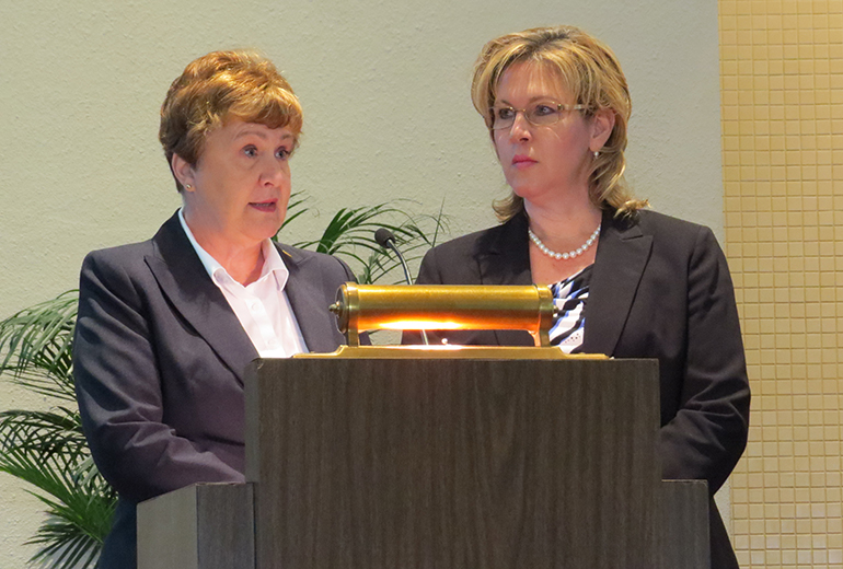 Bonnie Alkema, left, executive director of Catholic Hospice, and Patricia Gunn, chief financial officer, thanked families of the deceased for letting Catholic Hospice be part of their journey of grieving and healing.