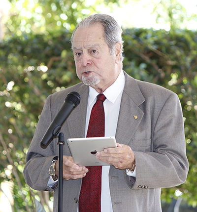 Humberto Estenoz, president of the International Press Club of Miami, enumerates the reasons why Archbishop Thomas Wenski is being honored by his group as well as the Florida Association of Hispanic Journalists.