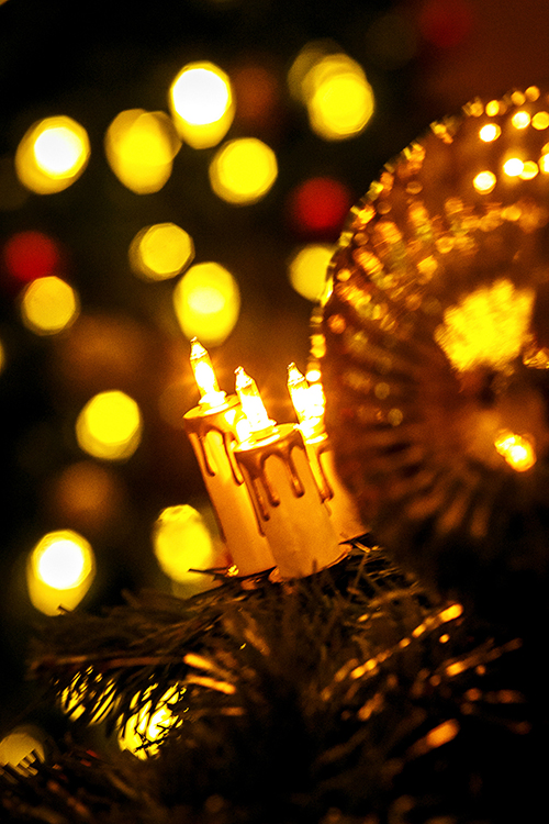 Candles and ornaments can serve as reminders of the light of Christ.