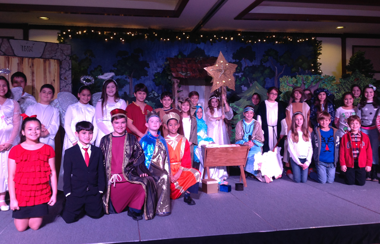 St. Brendan Elementary students know how to put on a show. After this year's Christmas play, fourth graders and all who participated posed for a group photo.