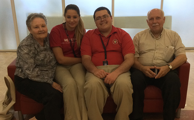 Deacon Julke Llorens, right, a 1964 Pace High graduate, is shown here with his wife, Mary, and their grandchildren, Carlos Gonzalez, a senior, and Claudia Gonzalez, a sophomore, who mark the third generation of the Llorens family to attend the high school.