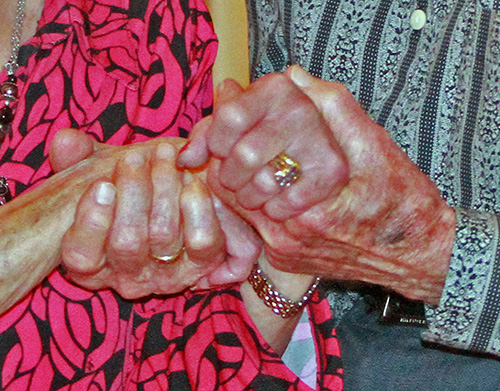 Close-up of Rosa and Armando Fernandez's hands during the renewal of vows at the 2013 archdiocesan Mass for couples marking 25, 50 and more years of marriage.