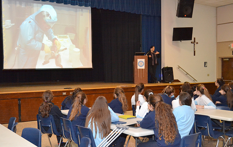 Lourdes Academy alumna Dr. Aileen Marty speaks to students interested in medical careers at her alma mater.