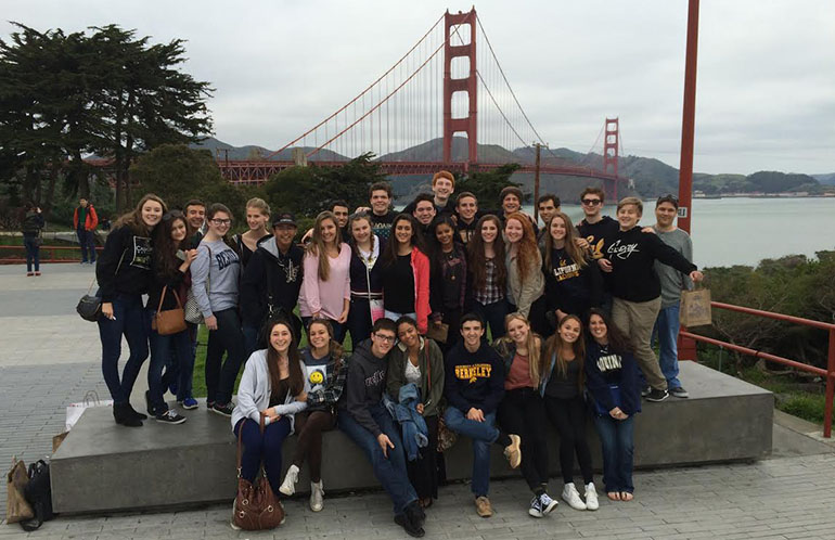 St. Thomas Aquinas High School's Speech and Debate team pose for a photo in front of the Golden Gate Bridge after competing in the University of California-Berkeley 42nd annual Debate Tournament.