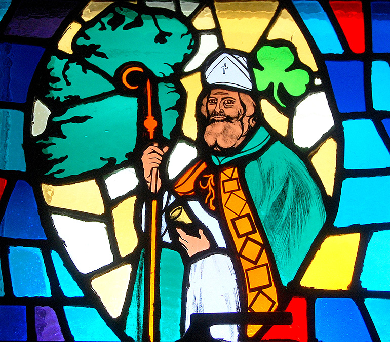 St. Patrick, Ireland's great evangelizer, is featured in a stained-glass window at St. Gabriel Church, Pompano Beach.
