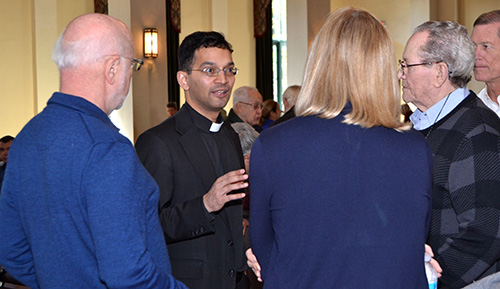 Father Earl Fernandes, dean of the Athenaeum of Ohio, Cincinnati, answers questions from some of those who attended the day-long symposium on death, dying and Catholic funeral rites hosted by Little Flower in Coral Gables.