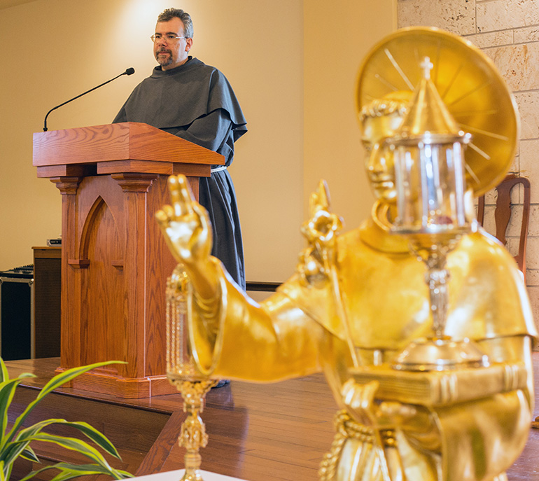 Franciscan Father Alessandro Ratti addresses the congregation at Our Lady of La Vang Vietnamese Mission after the relics of St. Anthony of Padua were brought into the church.
