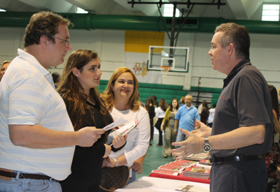 There is nothing better than speaking with a college representative who is also an alumni. Cornell University alumni representative and NBC 6 meteorologist John Morales (right) speaks with St. Brendan junior Victoria Popp (in black) and her parents, Howard and Vivian Popp, about his college experience at Cornell.