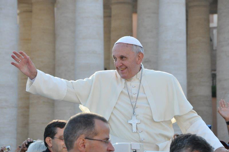 Pope Francis greets the crowd at a Wednesday audience in St. Peter's Square.