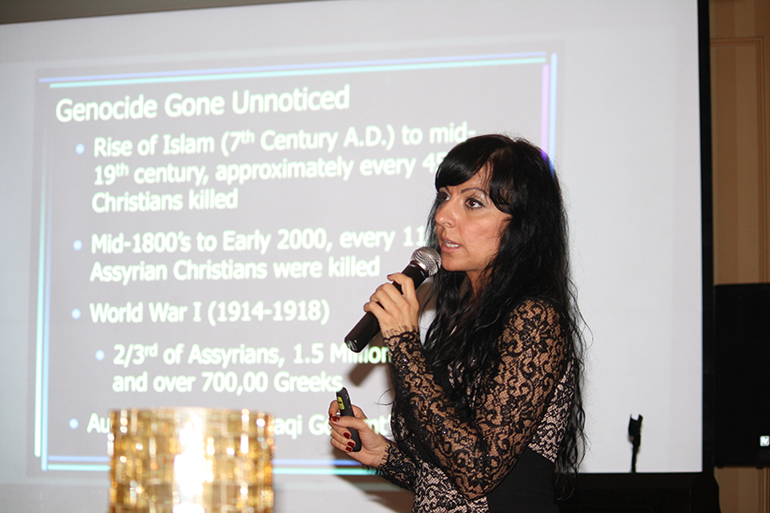 Juliana Taimoorazy, founder of the Iraqi Christian Relief Council, gives a historical overview of Iraqi Christians' persecution during her keynote presentation.