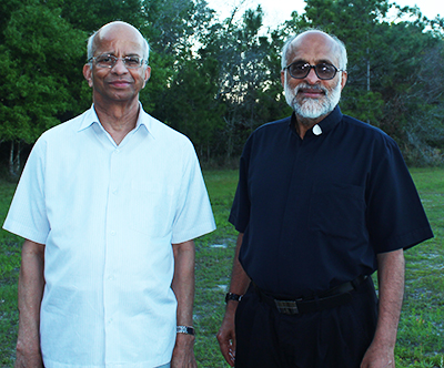 Father Augustine Mendonca, professor emeritus of canon law at St. Paul University, Ottawa, Canada, left, poses with Father Mathew Thundathil, a judge in the Metropolitan Tribunal of the Archdiocese of Miami.