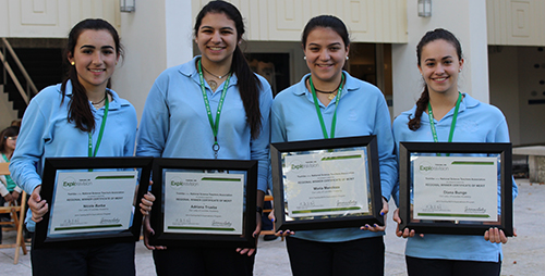 Lourdes Academy freshmen, from left, Nicole Barba, Adriana Trueba, Maria Mendoza and Diana Bunge pose with their ExploraVision regional winners certificates. Their project, “Baby Bangle,” created a body temperature monitoring/notification device for infants who are at risk or have suffered from febrile seizures.