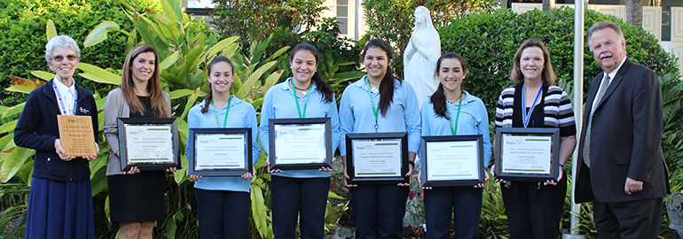 Lourdes Academy's regional winners in this year's ExploraVision competition pose with their certificates alongside the school's principal, Sister Kathryn Donze of the Sisters of the Immaculate Heart of Mary, far left; team mentor Veronica Barba, second from left; Susan Fleming, science department chair and team coach, second from right; and Gary Miller, Toshiba representative, far right. The winning team members are, from left, Diana Bunge, Maria Mendoza, Adriana Trueba and Nicole Barba.