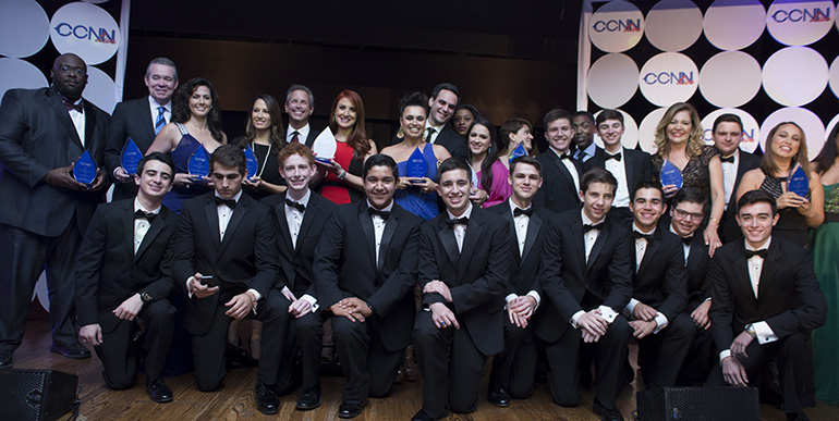Christopher Columbus High School's award winning CCNN Live team pose with local media professionals at their second annual Media Excellence Awards, a fundraising gala that took place March 14.
