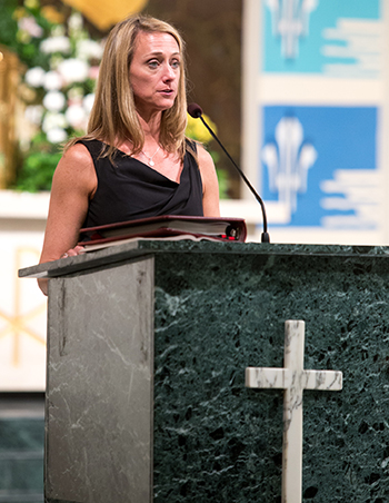 Johanna Saxton Shields, a member of the St. Thomas More Society of South Florida, reads prayers of the faithful at the annual Red Mass April 23 at St. Anthony Church in Fort Lauderdale.