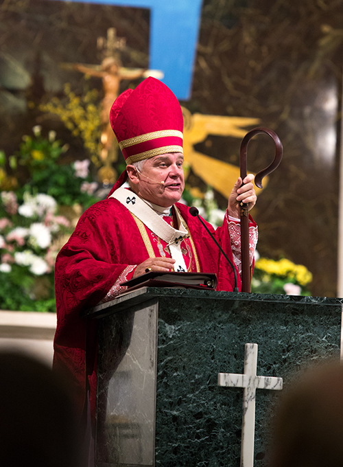 Archbishop Thomas G. Wenski preaches at the annual Red Mass for the Catholic legal community of Broward County, celebrated April 23 at St. Anthony Church in Fort Lauderdale. Catholic lawyers, judges, law enforcement and elected officials who are members of the St. Thomas More Society of South Florida convened with the archbishop for the 26th annual Mass followed by an awards reception and banquet.