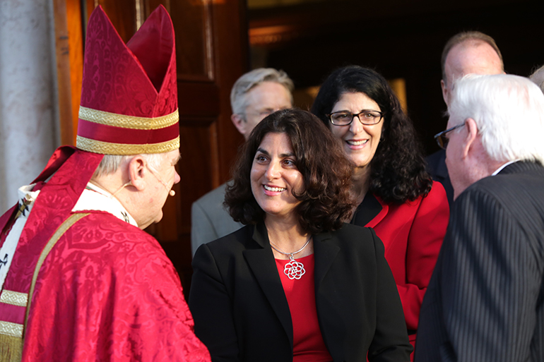 Archbishop Thomas G. Wenski greets legal professionals after presiding at the annual Red Mass for the Catholic legal community of Broward County, celebrated April 23 at St. Anthony Church in Fort Lauderdale.