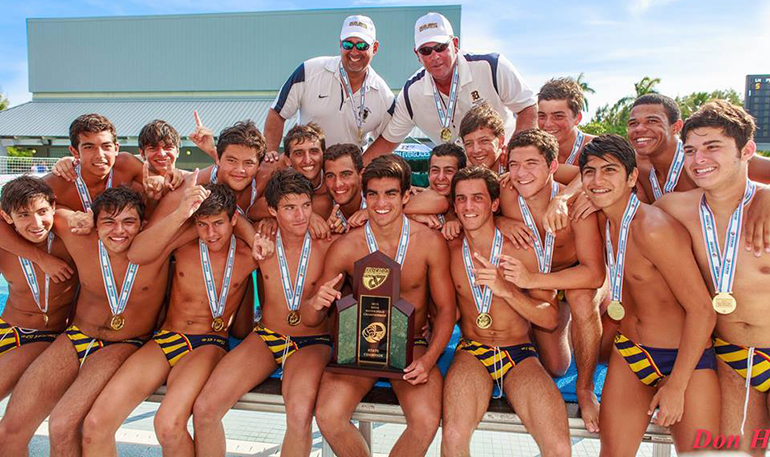 Belen Jesuit Prep's water polo team poses with their 2015 state championship plaque and medals.