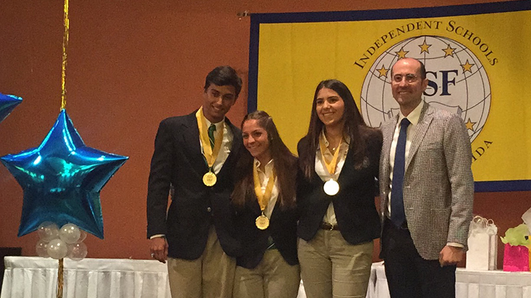 St. Brendan's 2015 Star award winners, from left, Felipe Bertrand, Gabriella Gonzalez and Arianna Gonzalez Molero pose with the school's principal, Jose Rodelgo-Bueno.