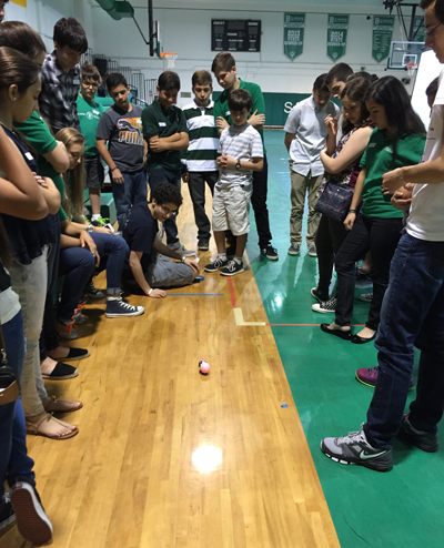 STEM Day hosted by St. Brendan High in association with FIU's Tau Beta Pi's Engineering Honor Society allowed for middle school students' imaginations and curiosity to run wild. Students enjoyed hands-on activities that tested their creative engineering like balloon-powered cars designed out of Legos, as shown in this picture.