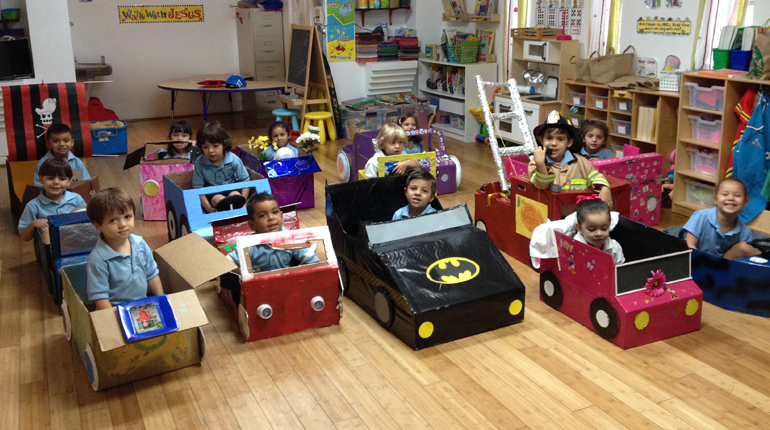 A pirate ship, a Batmobile and a firetruck, along with an entourage of vibrantly colored convertibles, were all a part of Drive-In Movie Day for Pre-K3 students at Sts. Peter and Paul School. With a little help from their parents, students rode in to their in-class drive-in in style.