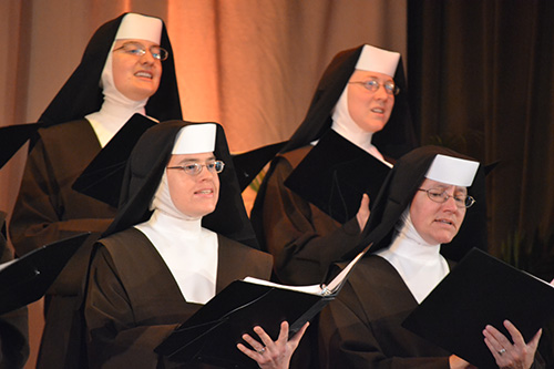 From top to bottom, left to right, the Carmelite Sisters performing included Sister Giana, Sister Teresa, Sister Juanita and Sister Rosalie Nagy, principal of Archbishop Coleman Carroll High School in Miami.