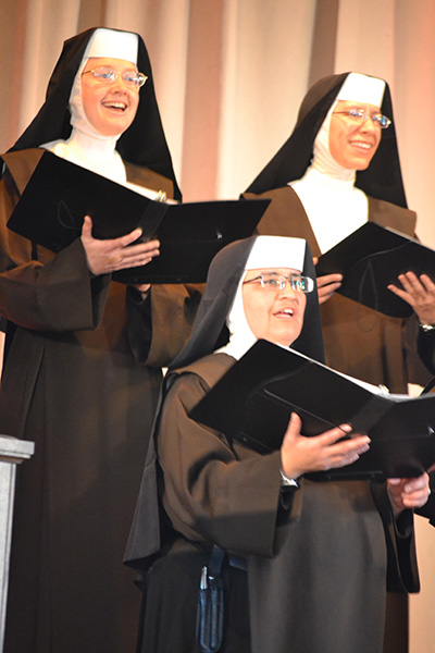 From top to bottom, left to right, the Carmelite Sisters performing included Sister Isabel, Sister Maria Goretti and Sister Lourdes.