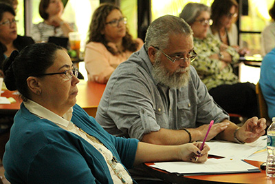 Rosa Frometa and Rafael Vazquez of St. Boniface Church in Pembroke Pines listen closely to details at the Earth Day Facility Management Training Seminar. With a green project of their own in mind, St. Boniface will be incorporating the help of their 81 ministries.